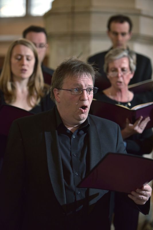 Jo, Merlin, John, Faith, Stephen  - Members of the Chandos Chamber Choir rehearsing in St Sepulchre Church in the City of London